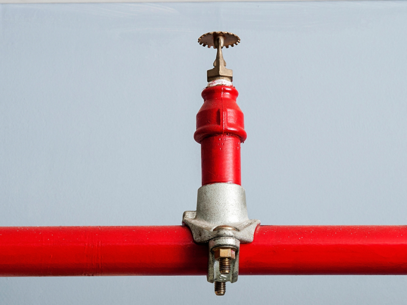 plumber-installing-fire-sprinkler-pipes-in-commercial-building-jhb-cbd-south-africa fire-safety-sprinkler-system-maintenance-by-professional-plumber-ensuring-reliability