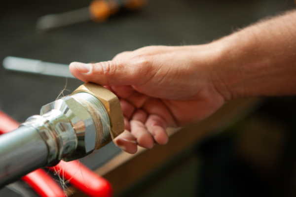 expert-plumber-realigning-drainage-for-optimal-pipe-performance